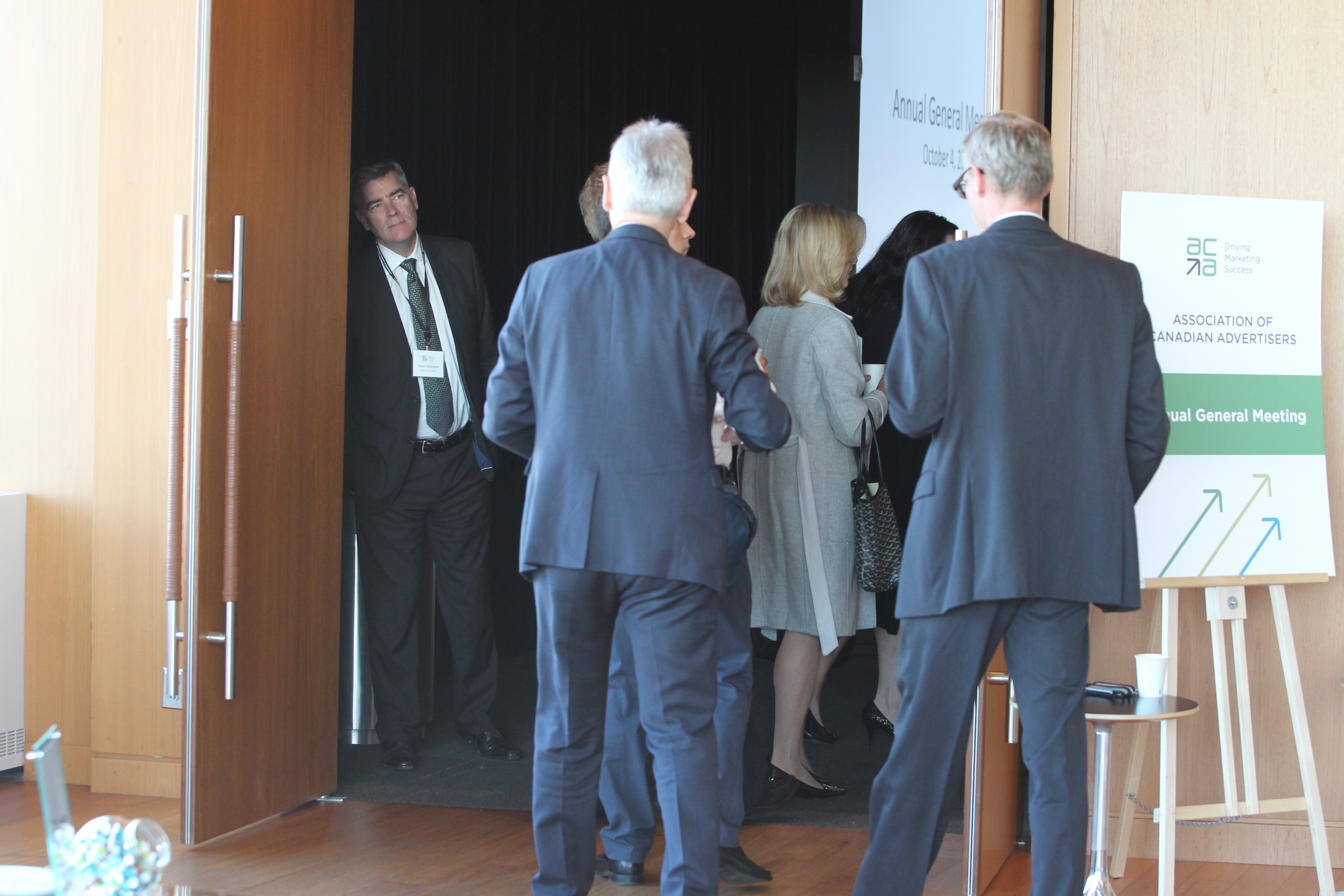 ACA members head in to the theatre for the AGM