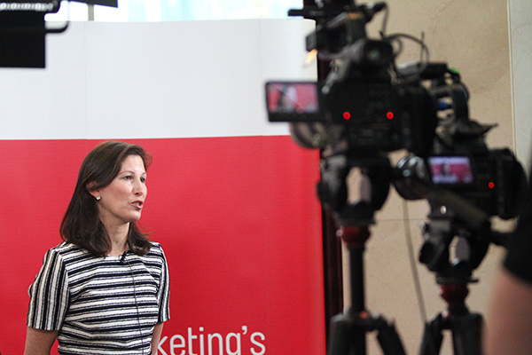 Lisa McKnight being interviewed on camera